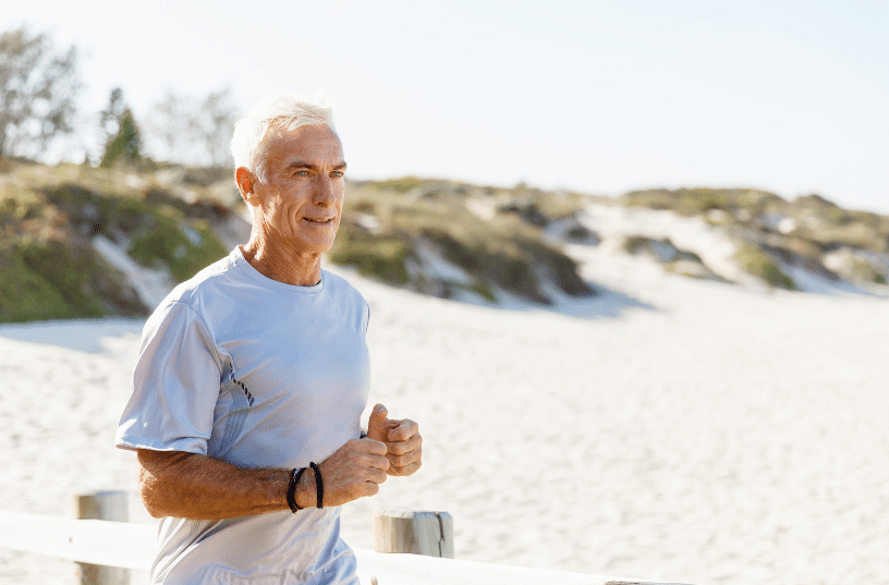 man running on the beach