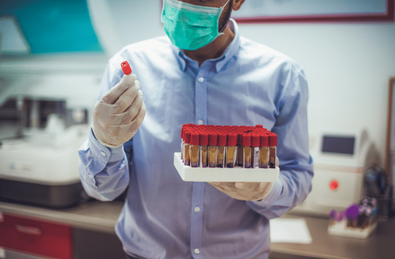 doctor looking at blood samples